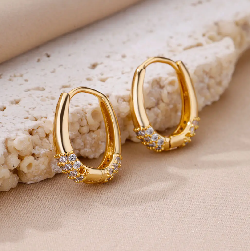 Créoles en plaqué or 18 carats avec zircon sur la base